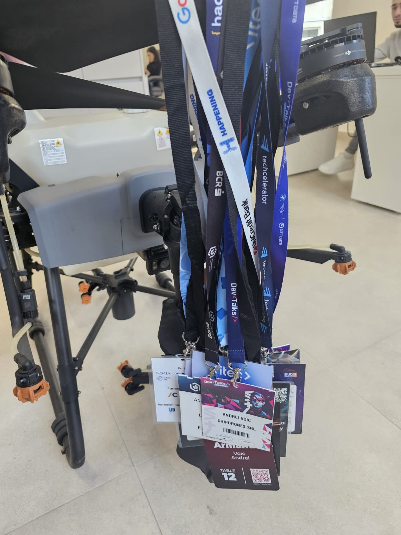 Collection of event badges and lanyards